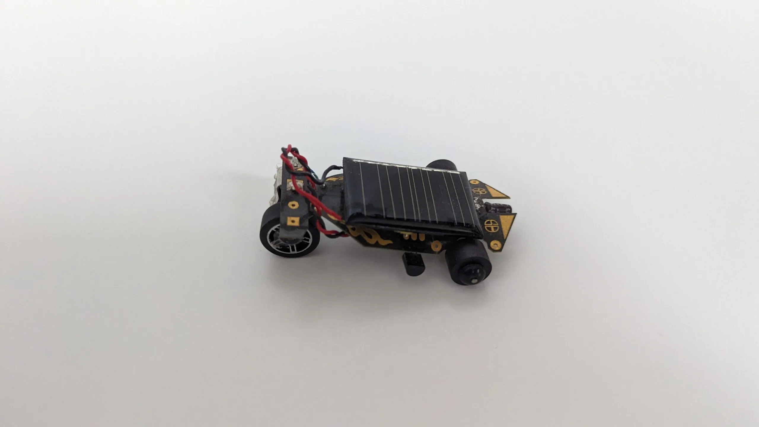 Side profile of the Solar Roller, spoked scavenged front wheel under the panel's edge