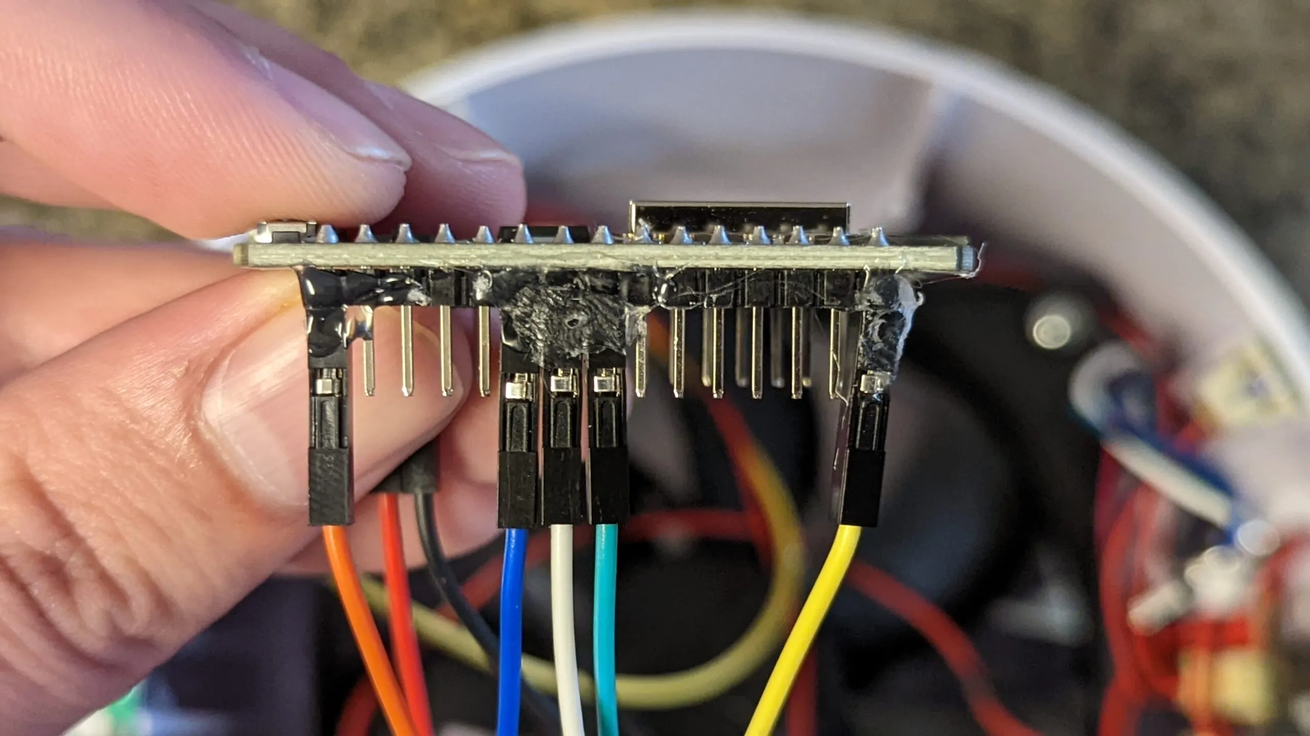 Jumpers hot-glued into the NodeMCU headers so fan vibration cannot shake them loose