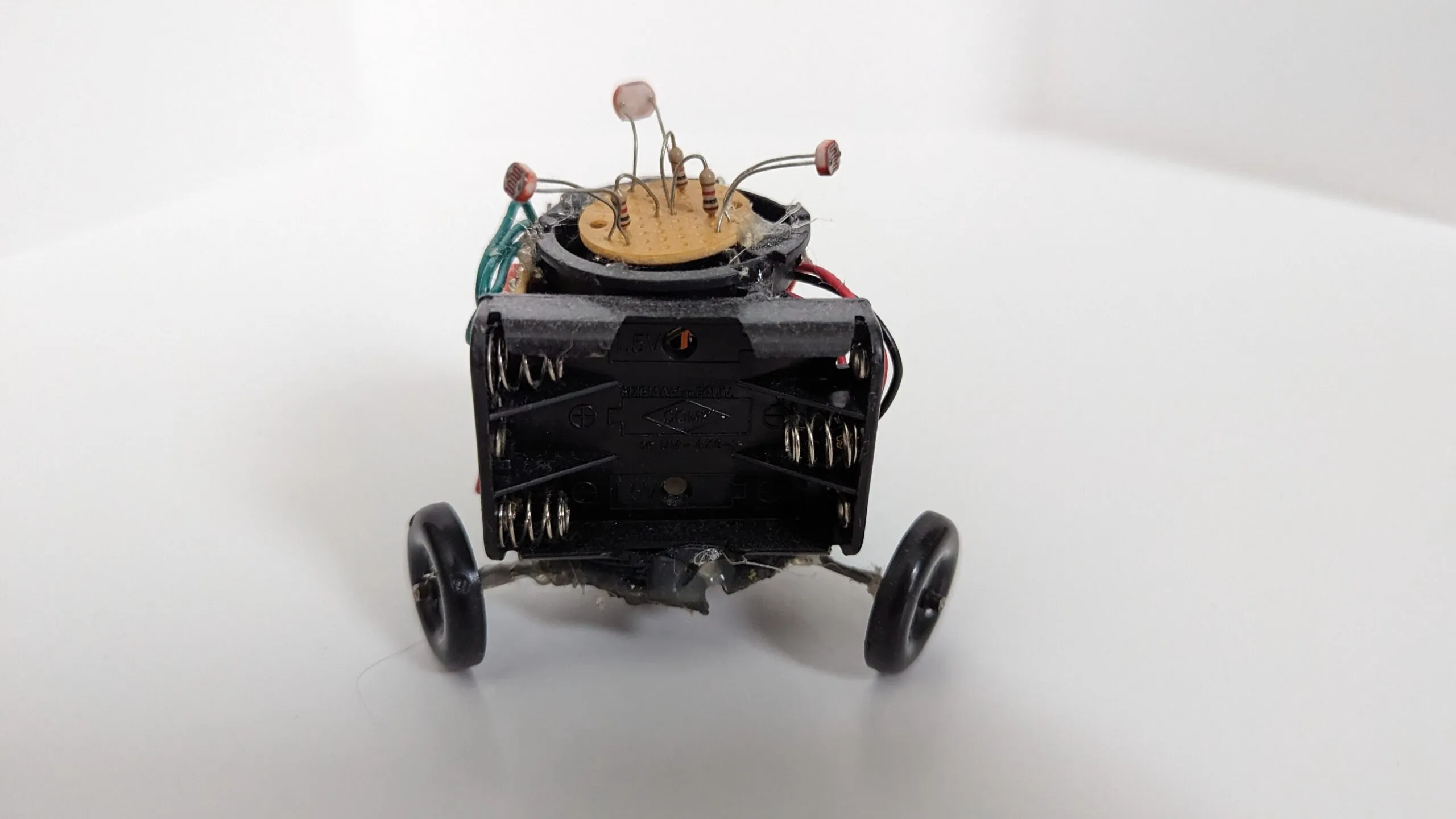 Triclops from behind: the empty AAA holder that doubles as its backbone